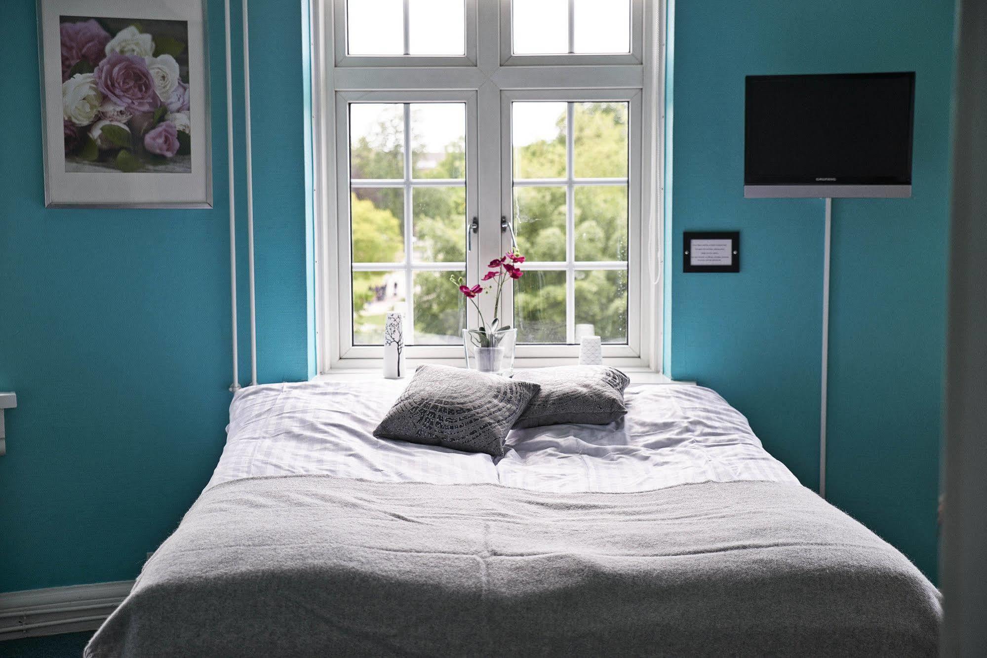 ダンホステル オーデンセ シティ エクステリア 写真 A bedroom