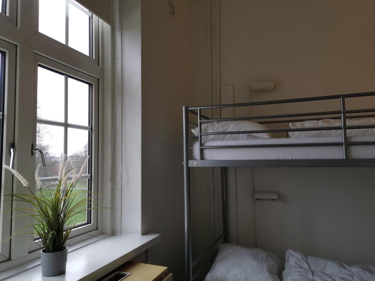 ダンホステル オーデンセ シティ エクステリア 写真 A room at the hostel